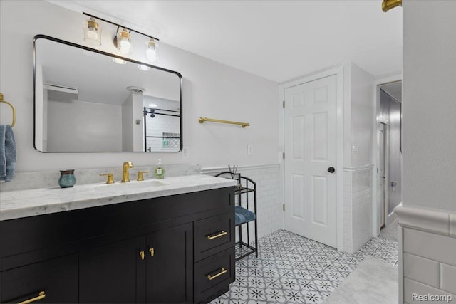1101 Shallowdale Dr, Troy, MI 48085 - full bathroom featuring a wainscoted wall, vanity, and tile walls