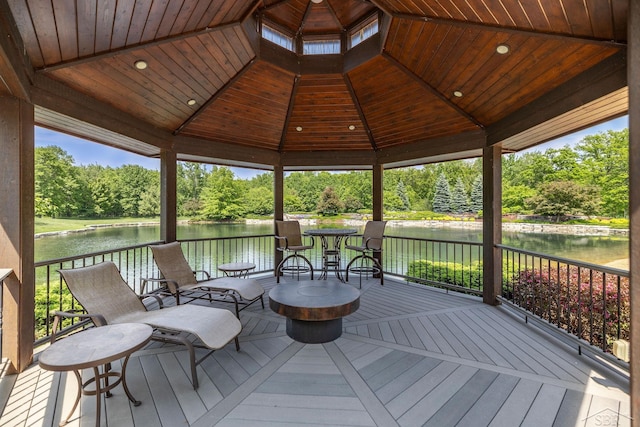 199 E Brooks Rd, Midland, MI 48640 - wooden terrace with a gazebo, a water view, and view of scattered trees