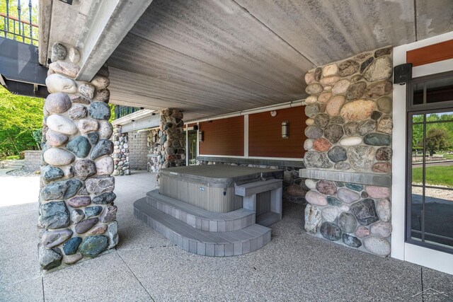199 E Brooks Rd, Midland, MI 48640 - view of patio / terrace with a hot tub