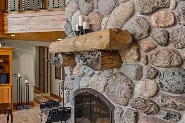 199 E Brooks Rd, Midland, MI 48640 - detailed view of baseboards and a stone fireplace