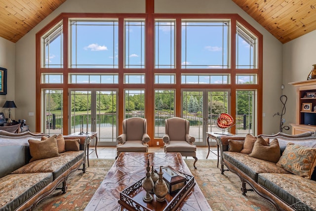 199 E Brooks Rd, Midland, MI 48640 - living area with healthy amount of natural light, high vaulted ceiling, wooden ceiling, and a water view