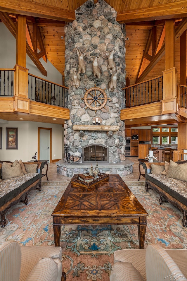 199 E Brooks Rd, Midland, MI 48640 - living room featuring high vaulted ceiling, a wooden ceiling with exposed beams, and a fireplace