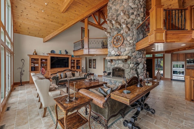 199 E Brooks Rd, Midland, MI 48640 - living room with high vaulted ceiling, stairs, a fireplace, light stone finish floors, and wooden ceiling