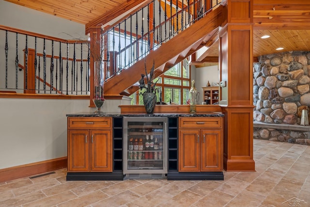 199 E Brooks Rd, Midland, MI 48640 - indoor dry bar featuring beverage cooler, wood ceiling, stairway, and recessed lighting