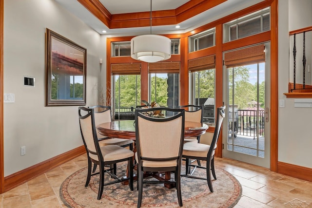 199 E Brooks Rd, Midland, MI 48640 - dining space with a raised ceiling and stone tile flooring