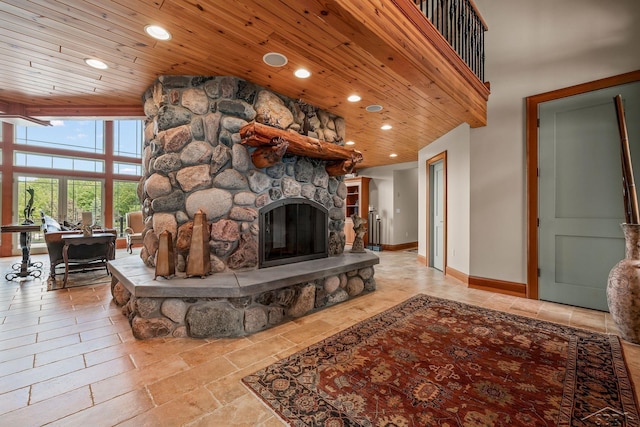 199 E Brooks Rd, Midland, MI 48640 - living area featuring wood ceiling, a stone fireplace, and recessed lighting