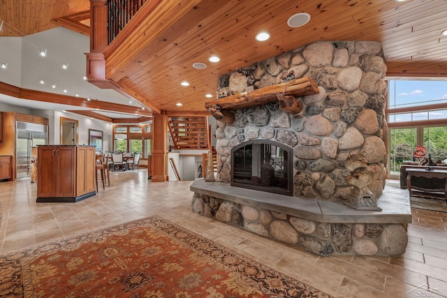 199 E Brooks Rd, Midland, MI 48640 - living area featuring high vaulted ceiling, wood ceiling, recessed lighting, a fireplace, and stone tile flooring