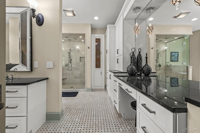 199 E Brooks Rd, Midland, MI 48640 - full bath with a stall shower, vanity, and recessed lighting