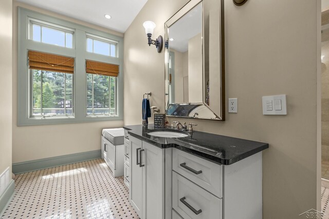 199 E Brooks Rd, Midland, MI 48640 - bathroom with vanity and tile patterned floors