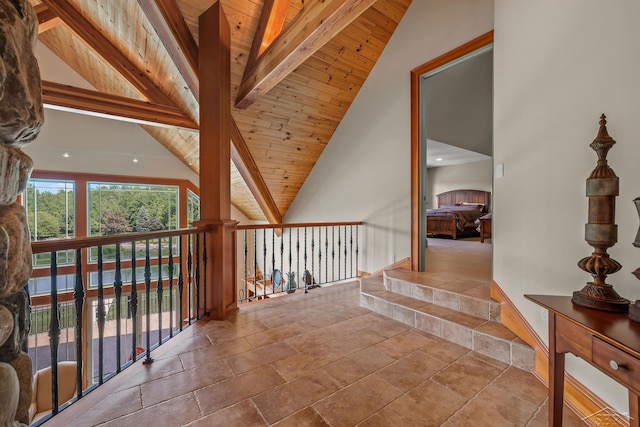 199 E Brooks Rd, Midland, MI 48640 - hallway featuring stone tile floors, a wood ceiling with exposed beams, and high vaulted ceiling