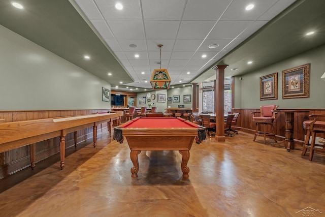 199 E Brooks Rd, Midland, MI 48640 - recreation room with a bar, concrete flooring, a wainscoted wall, billiards table, and decorative columns