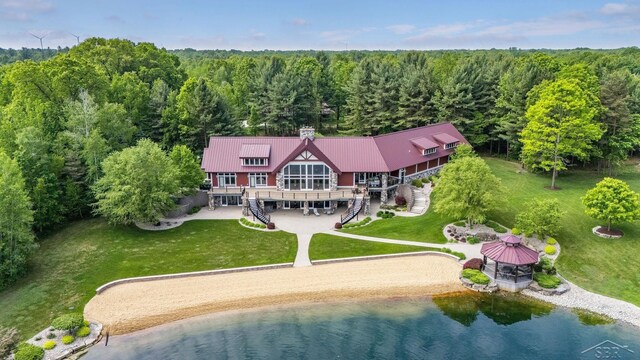 199 E Brooks Rd, Midland, MI 48640 - view from above of property with a heavily wooded area and a nearby body of water