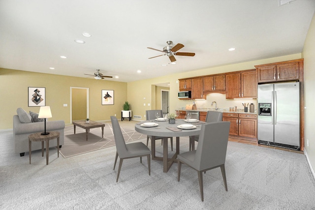 8842 Oakland Hills Cir, Portage, MI 49024 - dining space with ceiling fan, light colored carpet, and recessed lighting