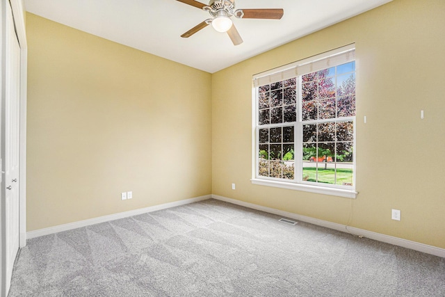 8842 Oakland Hills Cir, Portage, MI 49024 - carpeted spare room with ceiling fan and baseboards