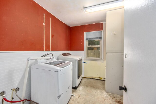 3050 Sharon Ave SW, Wyoming, MI 49519 - washroom with cabinet space, independent washer and dryer, and a wainscoted wall