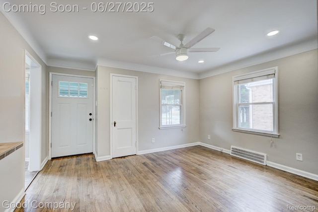 830 W Hazelhurst St, Ferndale, MI 48220 - foyer with ceiling fan, wood finished floors, crown molding, and recessed lighting