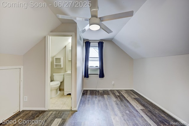 830 W Hazelhurst St, Ferndale, MI 48220 - additional living space with wood finished floors, ceiling fan, and vaulted ceiling