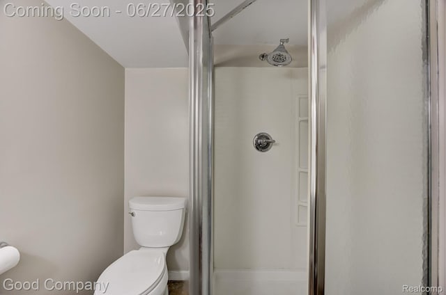 830 W Hazelhurst St, Ferndale, MI 48220 - bathroom featuring a stall shower and toilet