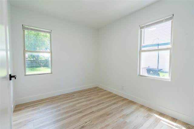 19228 Melvin St, Roseville, MI 48066 - spare room with light wood finished floors and baseboards
