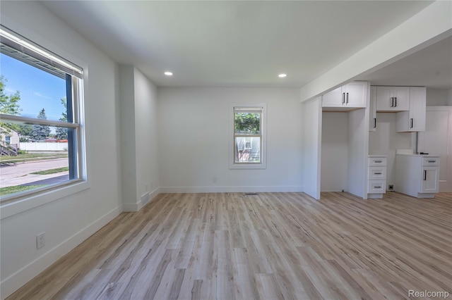 19228 Melvin St, Roseville, MI 48066 - unfurnished living room featuring light wood-type flooring and recessed lighting