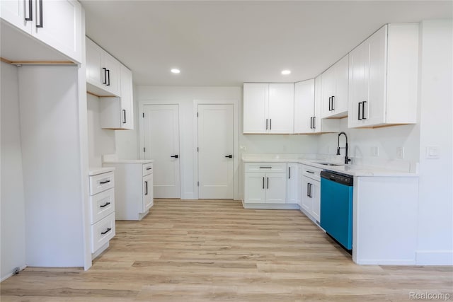 19228 Melvin St, Roseville, MI 48066 - kitchen with dishwasher, light wood-type flooring, recessed lighting, white cabinetry, and light countertops