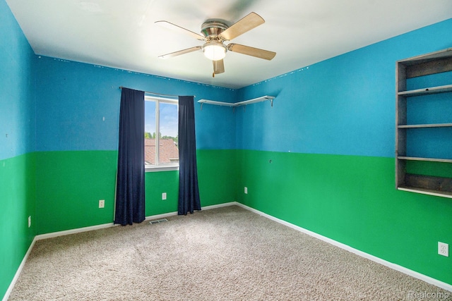 11275 Grand Oaks Dr, Clio, MI 48420 - unfurnished room with ceiling fan and carpet floors