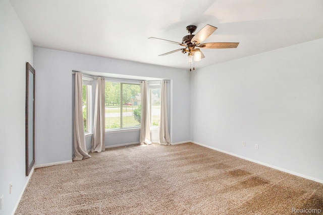 11275 Grand Oaks Dr, Clio, MI 48420 - unfurnished room with ceiling fan and carpet flooring
