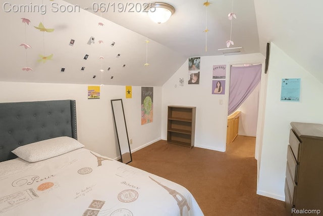 2614 Trumbull Ave, Flint, MI 48504 - carpeted bedroom with vaulted ceiling and baseboards