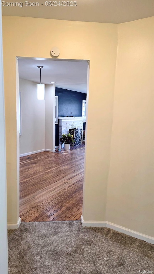 12280 Wade St, Detroit, MI 48213 - corridor featuring carpet flooring and wood finished floors