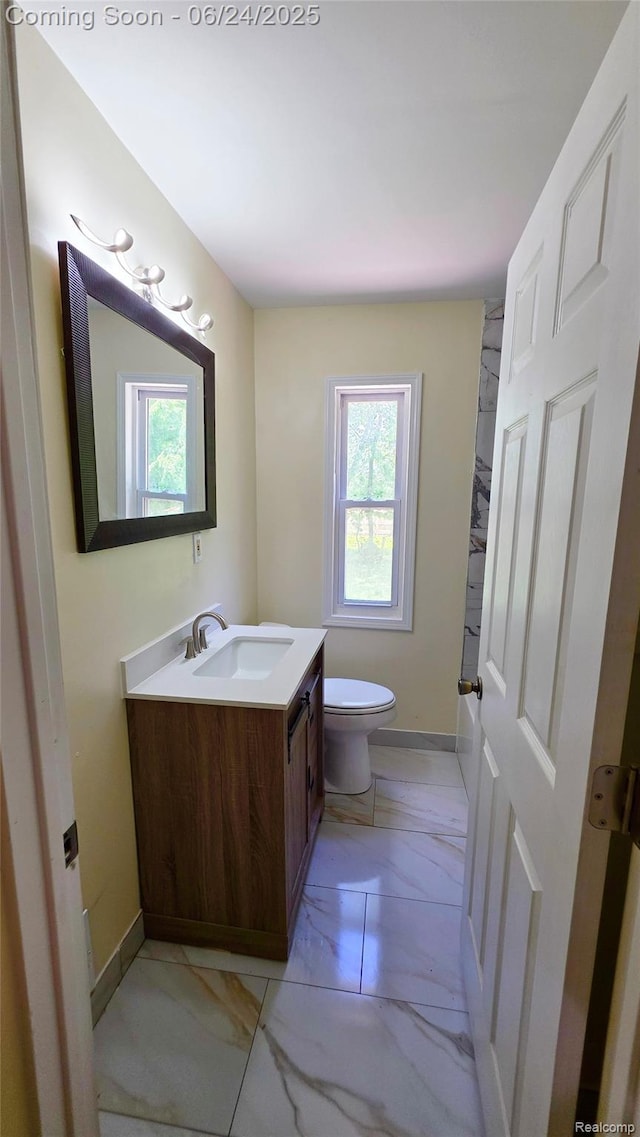 12280 Wade St, Detroit, MI 48213 - half bath featuring vanity and marble finish flooring