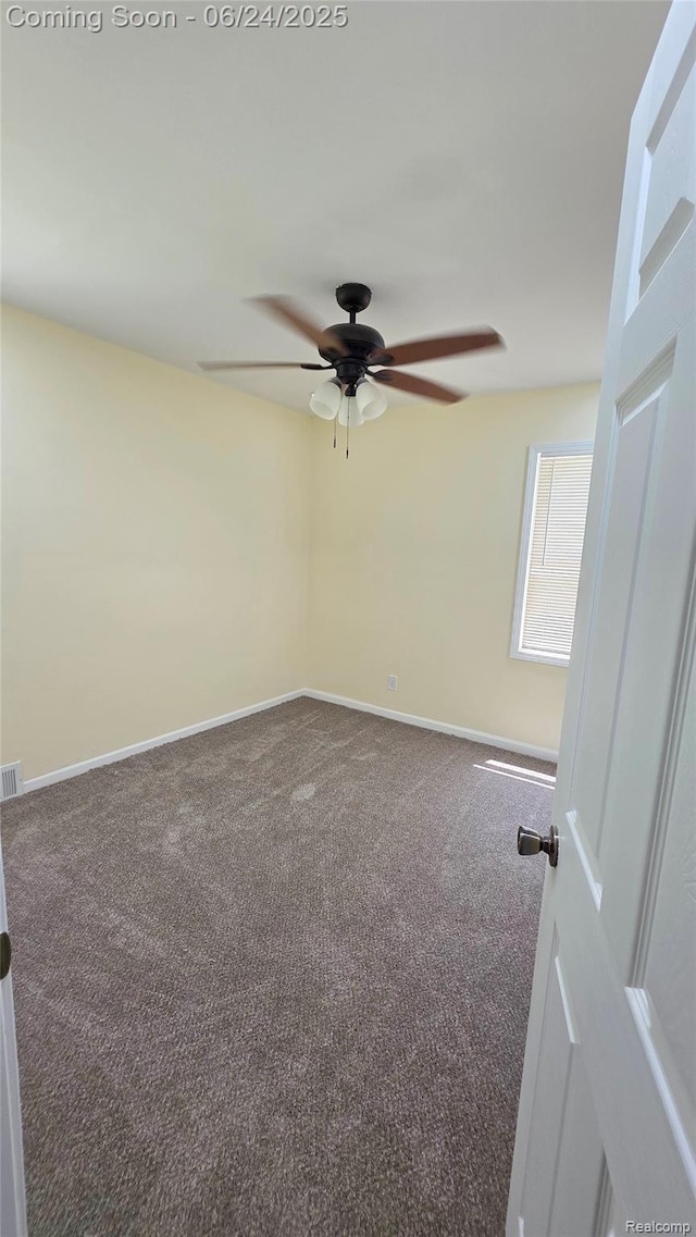 12280 Wade St, Detroit, MI 48213 - spare room featuring ceiling fan and carpet floors