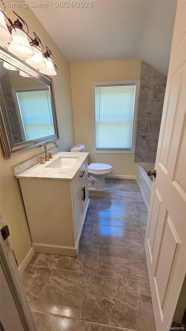 12280 Wade St, Detroit, MI 48213 - full bathroom featuring vanity, healthy amount of natural light, and stone finish flooring