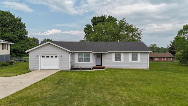 56570 Warren Dr, Dowagiac, MI 49047 - ranch-style home featuring concrete driveway, a garage, and a front yard