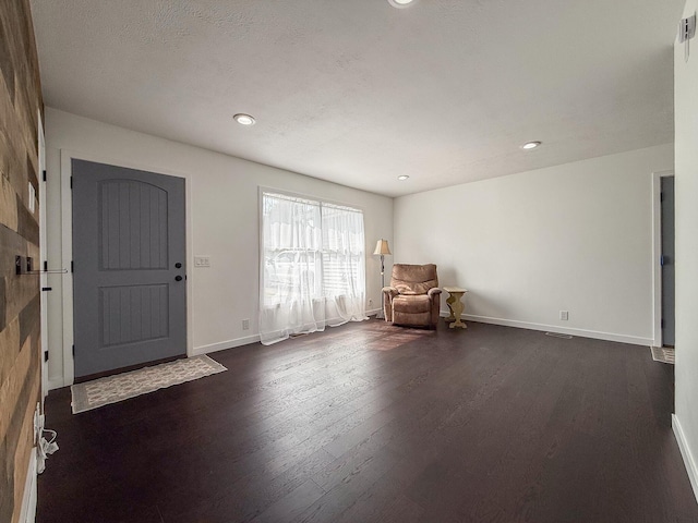 56570 Warren Dr, Dowagiac, MI 49047 - living area with dark wood finished floors and recessed lighting