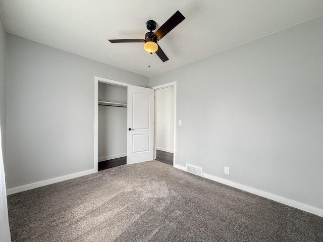 56570 Warren Dr, Dowagiac, MI 49047 - unfurnished bedroom featuring carpet, a closet, and ceiling fan