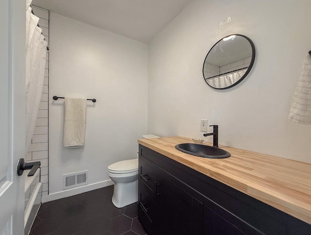 56570 Warren Dr, Dowagiac, MI 49047 - bathroom with vanity and tile patterned flooring