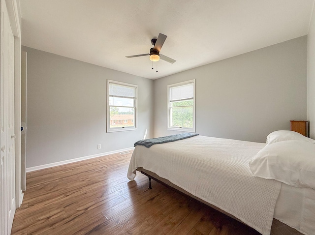 56570 Warren Dr, Dowagiac, MI 49047 - bedroom featuring wood finished floors and a ceiling fan