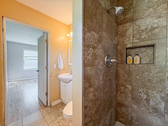 56570 Warren Dr, Dowagiac, MI 49047 - bathroom featuring tiled shower and vanity