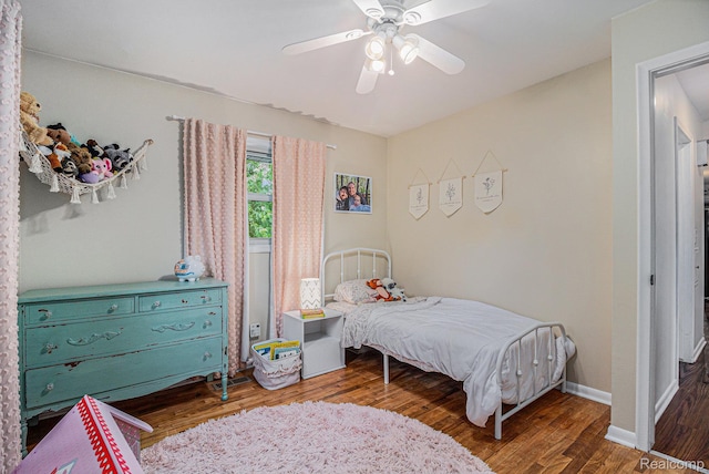5369 Old Franklin Rd, Grand Blanc, MI 48439 - bedroom with wood finished floors and a ceiling fan