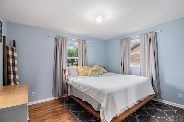5369 Old Franklin Rd, Grand Blanc, MI 48439 - bedroom with baseboards and wood finished floors