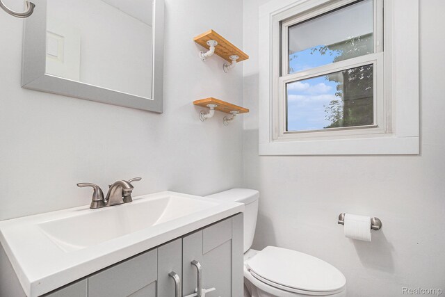 5369 Old Franklin Rd, Grand Blanc, MI 48439 - half bathroom featuring toilet and vanity