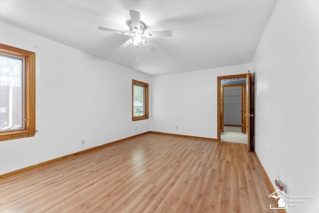 1617 Davis St, Wyandotte, MI 48192 - empty room with light wood finished floors and ceiling fan