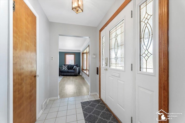 1617 Davis St, Wyandotte, MI 48192 - entrance foyer featuring baseboards and light tile patterned floors