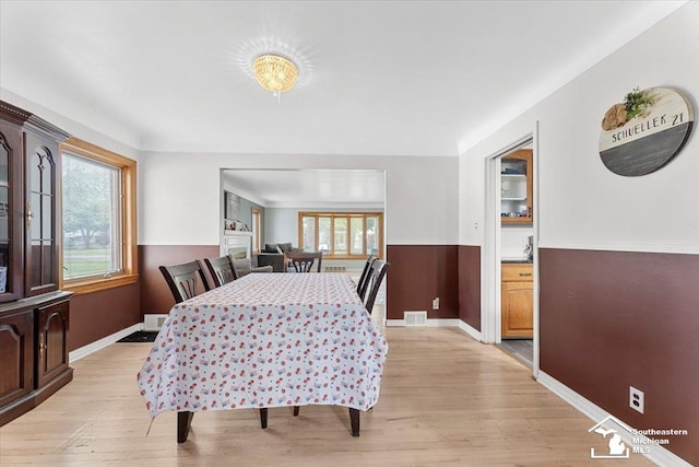 1617 Davis St, Wyandotte, MI 48192 - dining room featuring healthy amount of natural light and light wood-style flooring