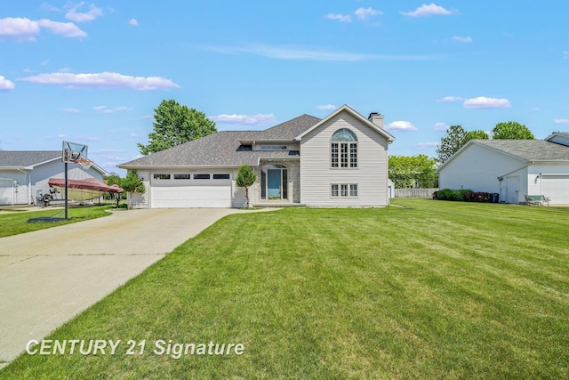2364 Milford Dr, Saginaw, MI 48603 - view of front of property featuring a chimney, driveway, and an attached garage