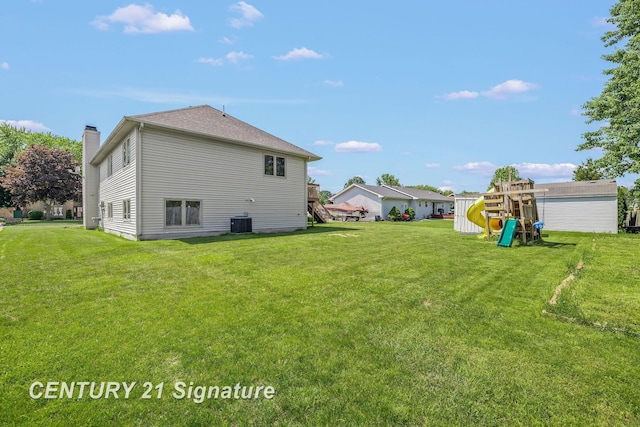 2364 Milford Dr, Saginaw, MI 48603 - back of property with a playground and a yard