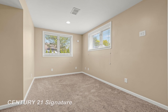 2364 Milford Dr, Saginaw, MI 48603 - carpeted empty room with baseboards and recessed lighting