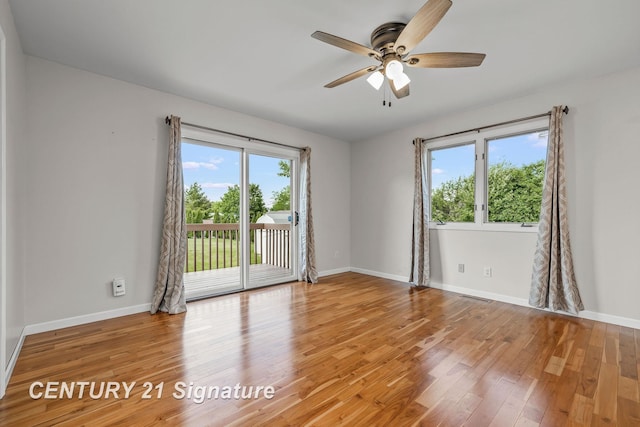 2364 Milford Dr, Saginaw, MI 48603 - empty room with a ceiling fan and light wood-type flooring