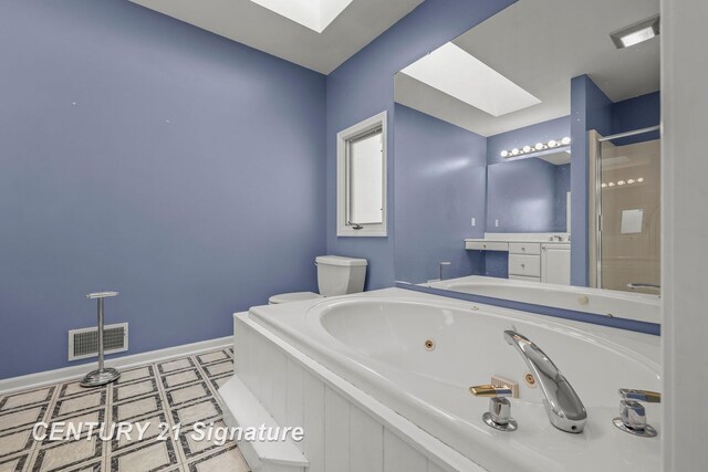 2364 Milford Dr, Saginaw, MI 48603 - bathroom featuring a whirlpool tub, a shower stall, a skylight, and vanity