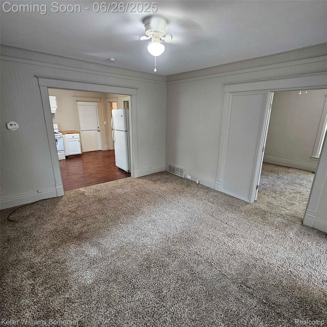 3909 Electric Ave, Port Huron, MI 48060 - unfurnished bedroom with carpet flooring, freestanding refrigerator, and ceiling fan